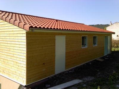Maison ossature bois, bardage bois et enduit sur isolation par l’extérieur 12